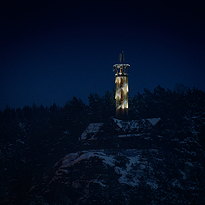 Illuminated viewtower at night.