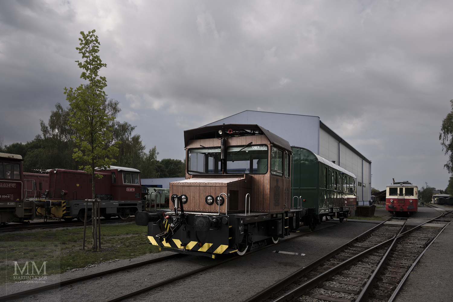 Brown electric locomotive.