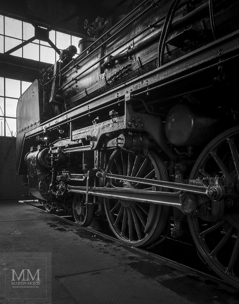 A steam locomotive.  Eisenbahnmuseum Dresden – Dresden Railway Museum.
