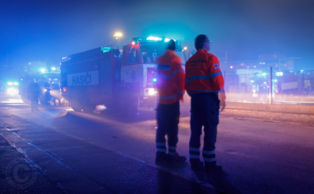 An ambulance crew near the fire. Fire at the railway station in Kralupy nad Vltavou.