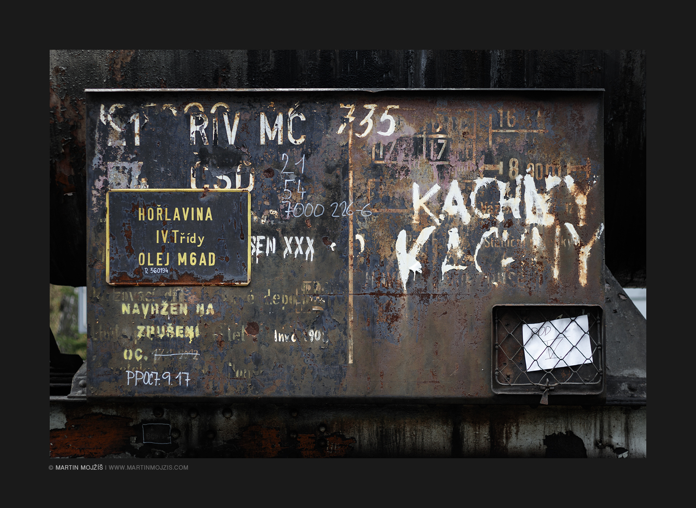 Various inscriptions on the board of the wagon. Railway (railroad) museum in Luzna near Rakovnik.