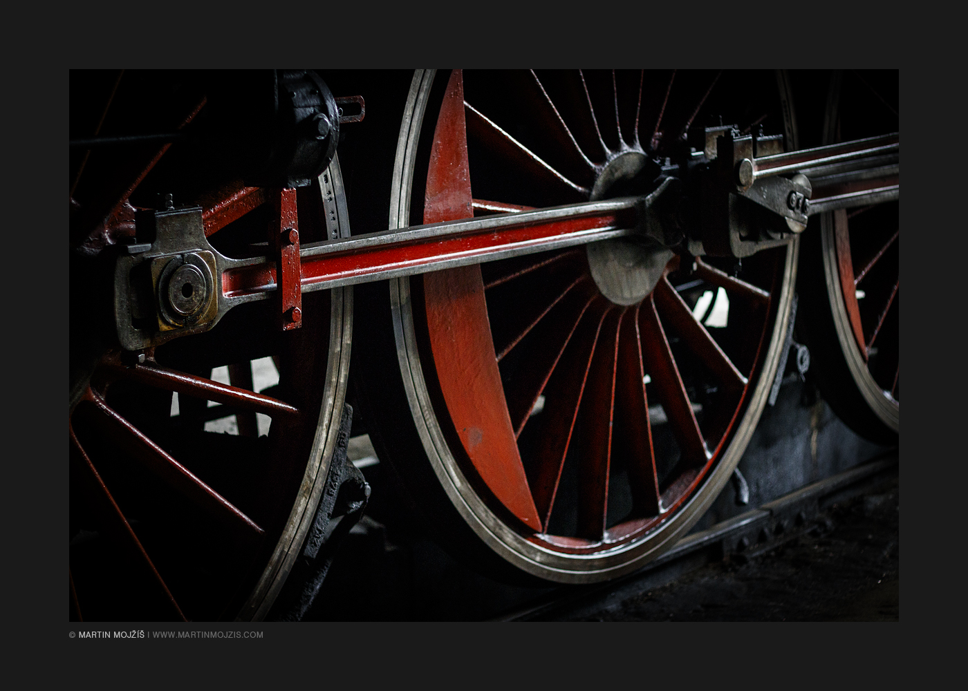 Steam locomotive wheels and rods close up. Railway (railroad) museum in Luzna near Rakovnik.