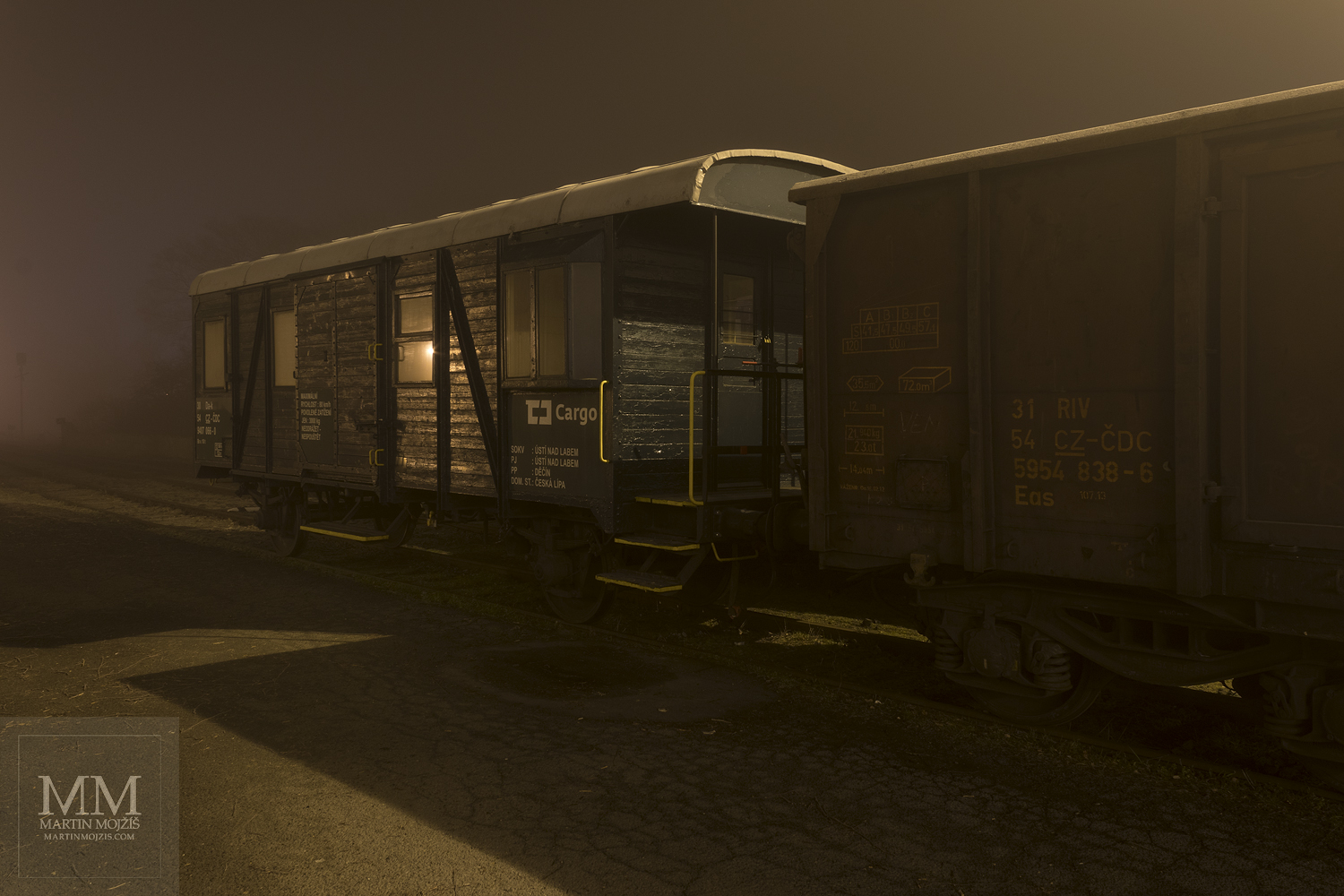 A historic wooden railroad car. Railway station Ceska Lipa.