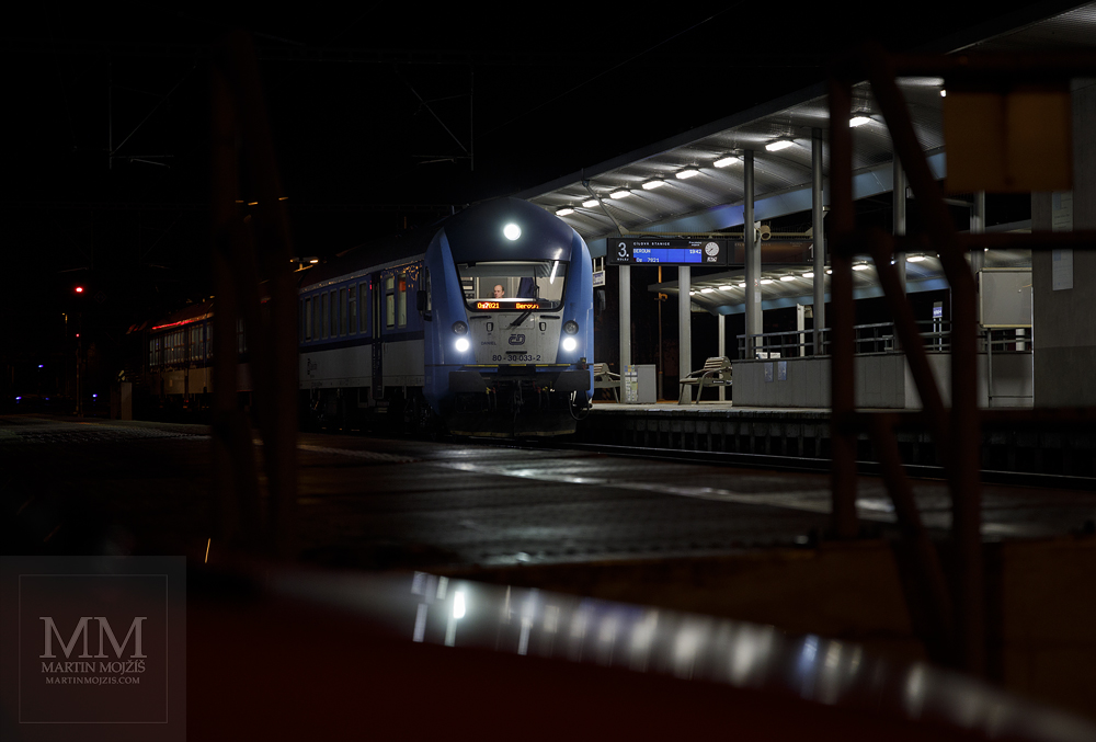 A night train in a station. Photograph created with Canon EOS R camera.