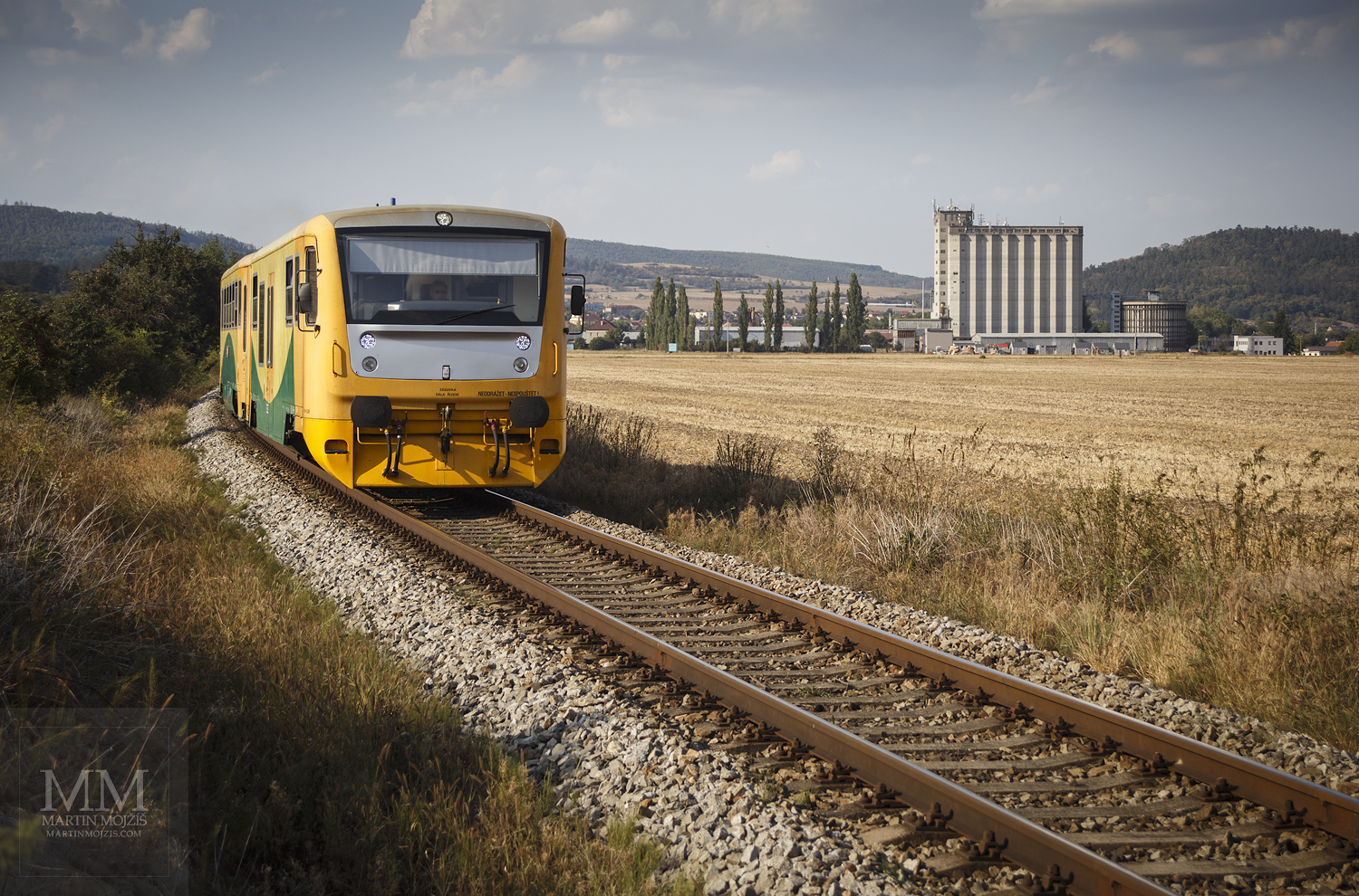 Large format, fine art photograph of yellow engine train. Martin Mojzis.