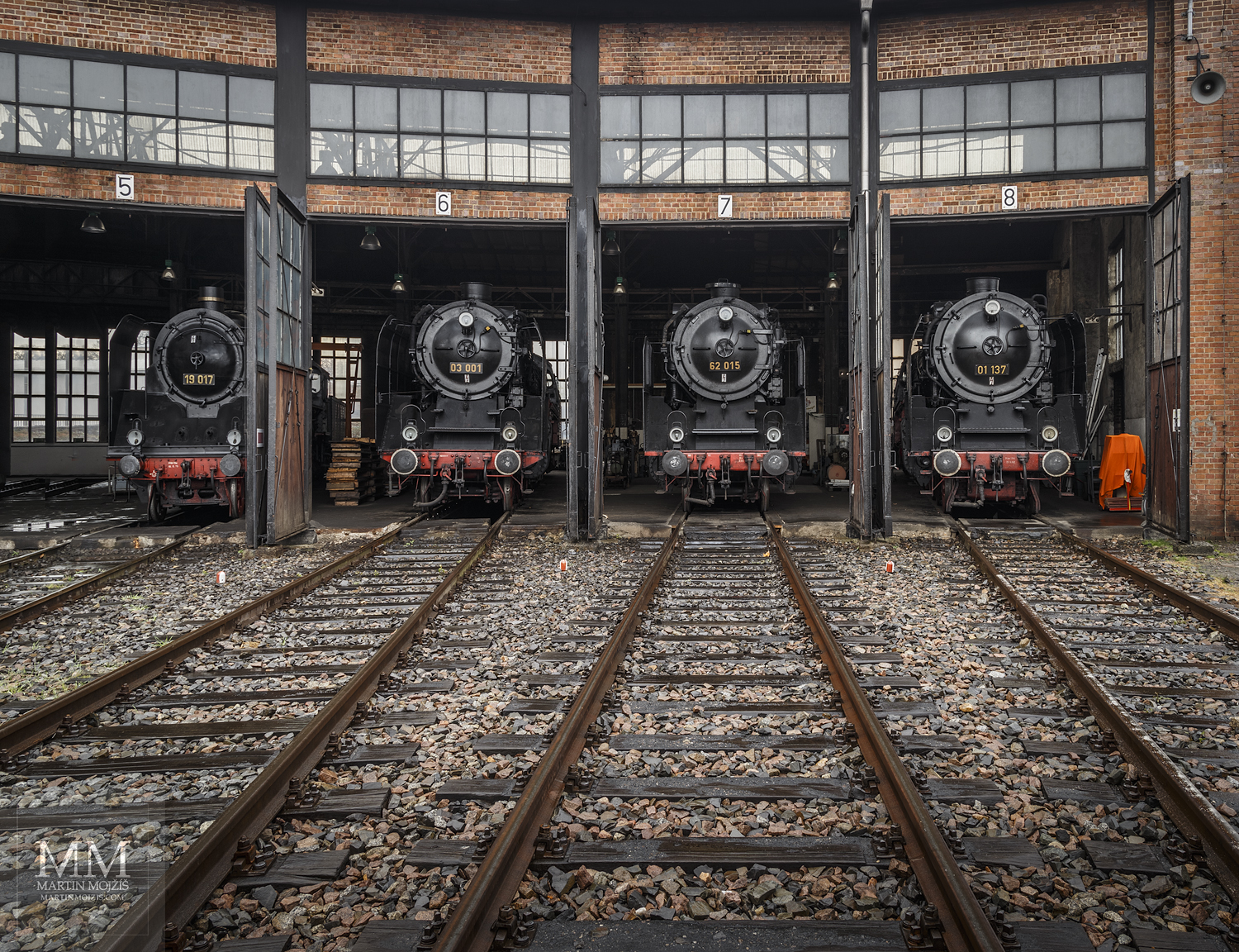 Large format, fine art photograph of steam locomotives in round railway depot close to turntable. Martin Mojzis.