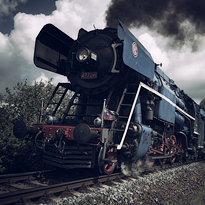 Photograph of the blue Czech steam locomotive Papousek. Introductory photograph of the gallery of large-format fine art photographs Diaries of photographer Martin Mojzis.
