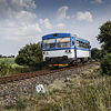 Fine-art photograph of small blue and white train. Martin Mojzis.