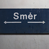 A blue table with word Smer (a distance) and two arrows.