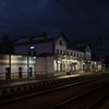 Zdice railway station building at twilight.